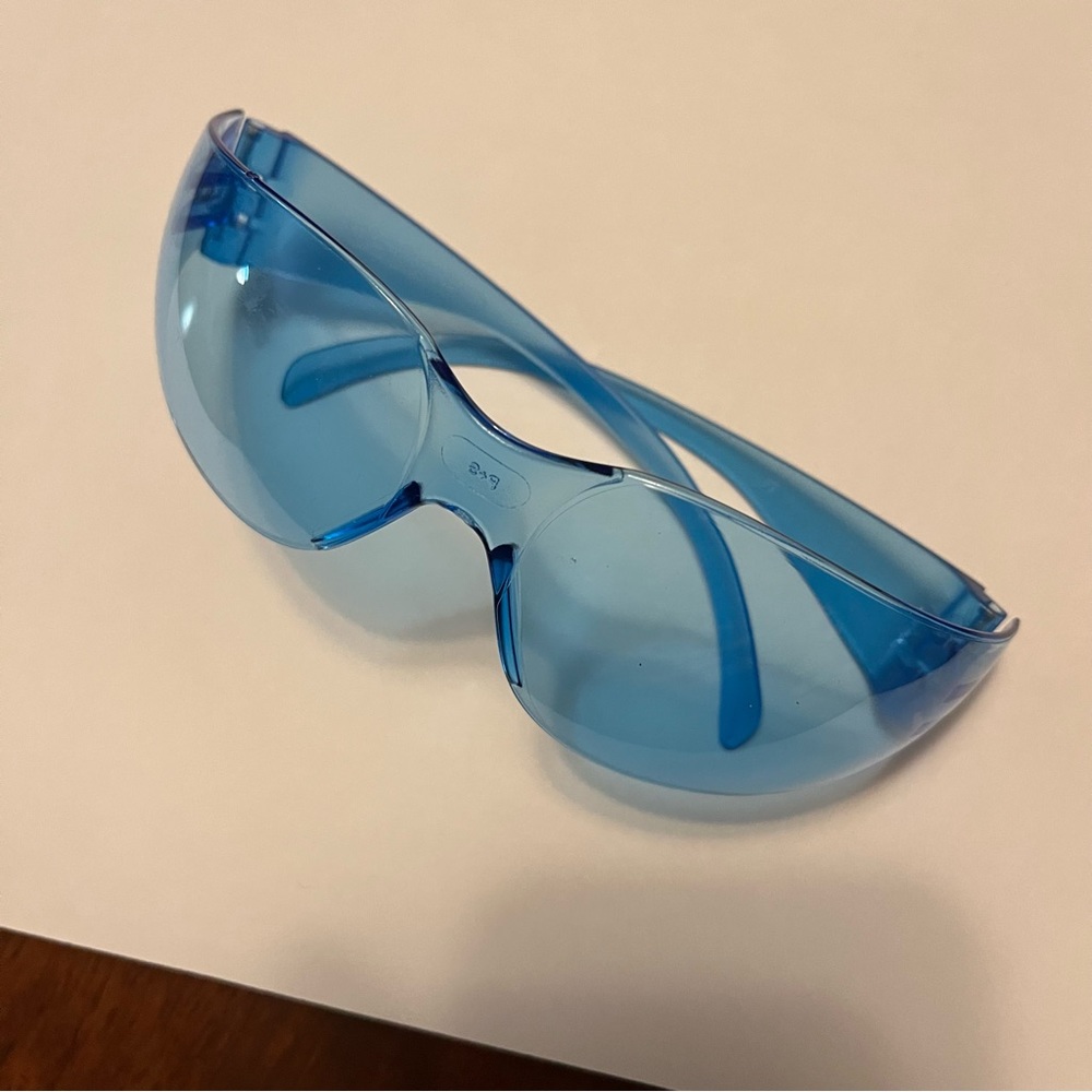 Sunglasses, safety glasses, wearable inside.